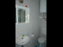 Apartmanok Iva - sea view A1(2+1), A2(4+1) Postira - Brac sziget  - Apartman - A1(2+1): fürdőszoba toalettel