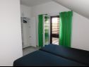 Apartmanok Coloured - apartments on island: A1 - plavi (4):, A2 -zeleni (4):, SA3 - studio (2+1):, A4 - bijeli (4+2): Povlja - Brac sziget  - Apartman - A4 - bijeli (4+2):: hálószoba