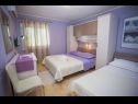 Apartmanok Palmina - comfort apartment: A1 veliki (6),  A2 žuti (4+1), A3 lila (2), SA4 bijeli (2) Makarska - Riviera Makarska  - Apartman - A1 veliki (6): hálószoba