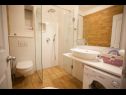 Apartmanok Palmina - comfort apartment: A1 veliki (6),  A2 žuti (4+1), A3 lila (2), SA4 bijeli (2) Makarska - Riviera Makarska  - Apartman - A3 lila (2): fürdőszoba toalettel