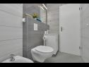 Apartmanok Smi - 250 m from sea: A1 juzni(2+1), A2 sjeverni(2+1), A3(4) Makarska - Riviera Makarska  - Apartman - A2 sjeverni(2+1): fürdőszoba toalettel