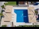 Apartmanok Petra - with pool: A1(4+2) Novalja - Pag sziget  - ház