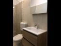 Apartmanok és szobák Mila - yard: A1(4+1), R1(2+1), R2(2) Supetarska Draga - Rab sziget  - Apartman - A1(4+1): fürdőszoba toalettel