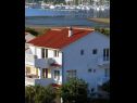 Apartmanok Tiho - 300 m from sea: A1(2), A2(4+2), A3(2) Supetarska Draga - Rab sziget  - ház