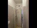 Apartmanok és szobák Mila - yard: A1(4+1), R1(2+1), R2(2) Supetarska Draga - Rab sziget  - Szoba - R1(2+1): fürdőszoba toalettel