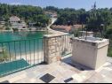 Apartmanok Primo - sea view: A1(2+1), A2(4), A3(4), A4(3+1) Öböl Banje (Rogac) - Solta sziget  - Horvátország  - kilátás (ház és környéke)