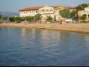 Apartmanok Vanja - terrace & BBQ A1(4+2), A2(4+1) Vir - Riviera Zadar  - strand