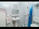 Apartmanok Katija - sea view: A1(2+1), A2(4+1) Postira - Brac sziget  - Apartman - A2(4+1): fürdőszoba toalettel