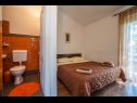 Apartmanok Perci- cosy and comfortable A1 Novi(2+2) , SA2 Stari(2) Krnica - Isztrián  - Apartman - A1 Novi(2+2) : hálószoba