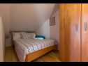 Apartmanok Duki - sea view: A1(4+1), A2(3+2) Makarska - Riviera Makarska  - Apartman - A1(4+1): hálószoba