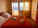 Apartmanok Paradiso with gorgeous sea view: A1 Doris (4+2), SA2 Petra (2+2), SA3 Nina (2) Lokva Rogoznica - Riviera Omis  - Apartman - A1 Doris (4+2): hálószoba