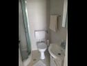 Apartmanok Zlatko Slobodan - by sea: A1(4), SA2(3) Stomorska - Solta sziget  - Apartman - A1(4): fürdőszoba toalettel