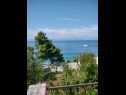 Apartmanok Zlatko Slobodan - by sea: A1(4), SA2(3) Stomorska - Solta sziget  - kilátás a tengerre (ház és környéke)