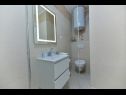 Apartmanok Vera - with nice view: A2-prvi kat (6), A1-prizemlje(4), A3-potkrovlje(6) Trogir - Riviera Trogir  - Apartman - A1-prizemlje(4): fürdőszoba toalettel