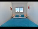 Apartmanok Vera - with nice view: A2-prvi kat (6), A1-prizemlje(4), A3-potkrovlje(6) Trogir - Riviera Trogir  - Apartman - A1-prizemlje(4): hálószoba